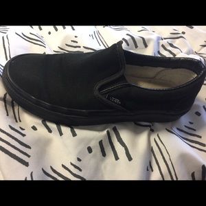 Vans black slip ons